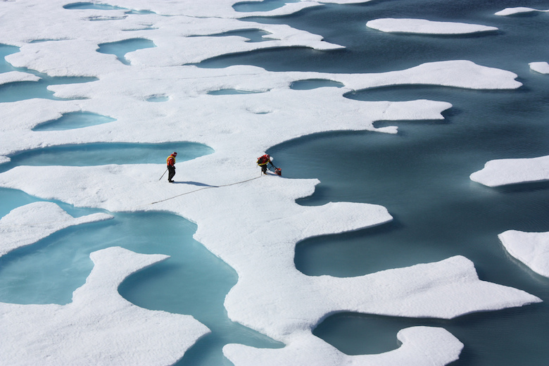 As sea ice atop the Arctic Ocean melts in summer the water can collect in depressions on the surface, forming freshwater ponds, as seen in this photograph from July 2011. Photo credit: NASA / Kathryn Hansen.